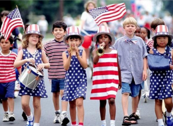 Children marching in red, white and blue